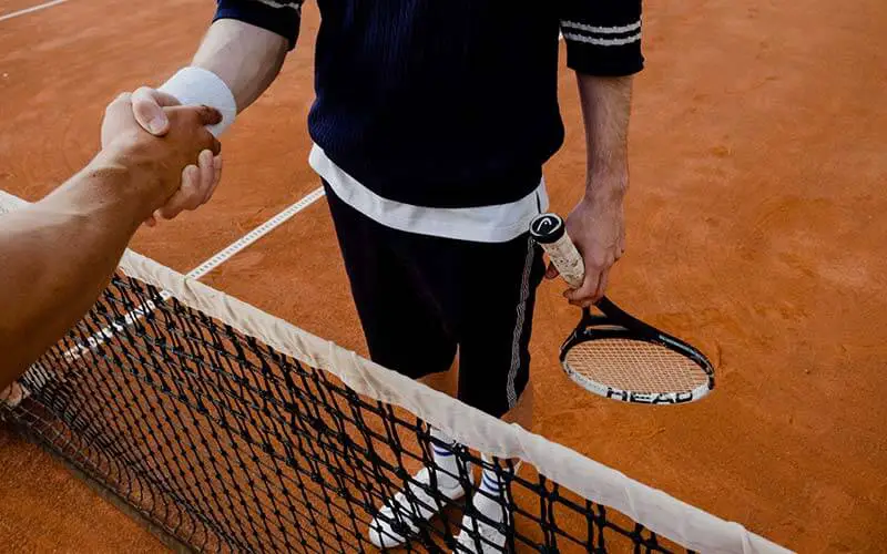 tennis players shaking hands