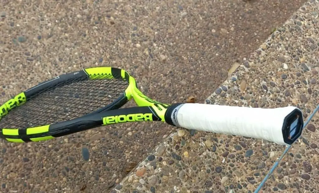 Racquet with overgrip